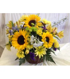 sunflowers with seasonal flowers basket